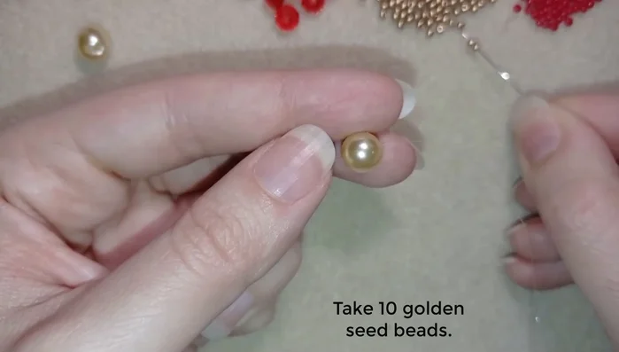 Repeat step 2, creating a second loop of 10 golden beads.