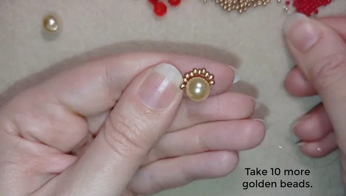 Repeat step 2, creating a second loop of 10 golden beads.
