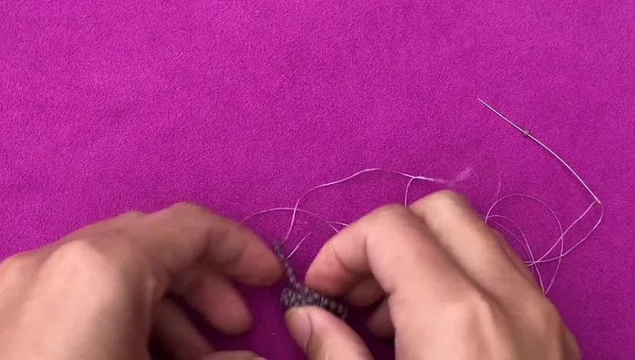 Connect band ends: Join the ends of the band, making sure to choose the correct beads for a clean join.