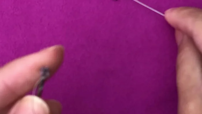 Build the first cube (trickiest part): This involves a unique beading technique. The video skips ahead to the step where three beads are added, then passed through the same bead from the other side, establishing the foundation of the cube.