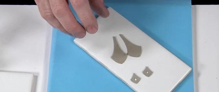 Set the nano gems into their bezels.