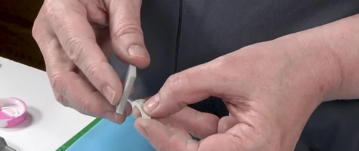 Drill holes in the earrings using a setting bur.