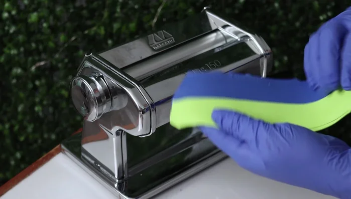 Run the clay through the pasta machine, fold in half again, aligning the seam.