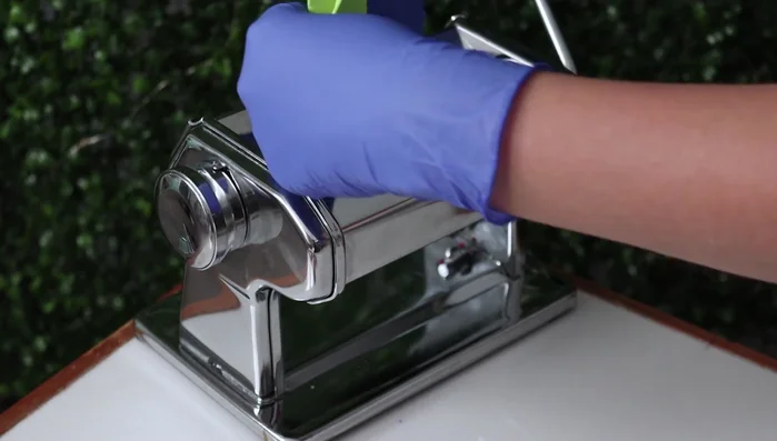 Run the clay through the pasta machine, fold in half again, aligning the seam.