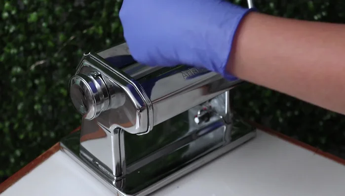 Continue running the clay through the pasta machine and folding until a smooth ombre is created.