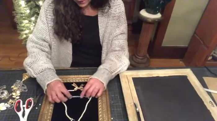 Assemble the tree: Start gluing the largest and most important pieces to the foam core using hot glue, focusing on creating the basic tree shape.