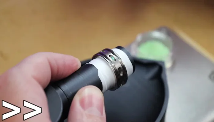 Fill the ring channels with CA glue and place the opal stones using tweezers or by pouring.