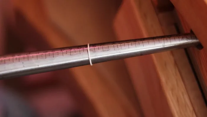 Sand off excess solder around the joint using files and polishing sticks.