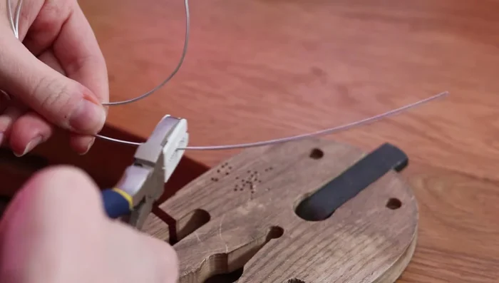 Cut and adjust the ring bands to the desired size. Use a mallet to even out any twists.