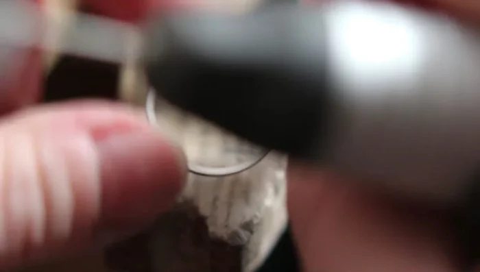 Clean the edges using polishing attachments designed for use near gemstones.