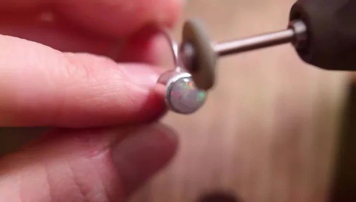 Clean the edges using polishing attachments designed for use near gemstones.