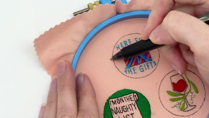 Cut out the design, leaving a little extra fabric around the embroidery.