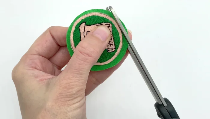 Trim excess felt from the back once the glue is dry.