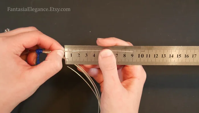 Secure the bead design: Repeat step 4 to secure the spirals.