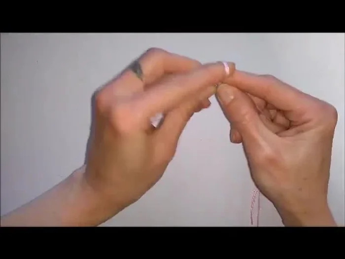 Arrange the two shorter ends on one side and the longest end on the other side of the board. Slightly separate the shorter ends and clip them to the bottom of the board.