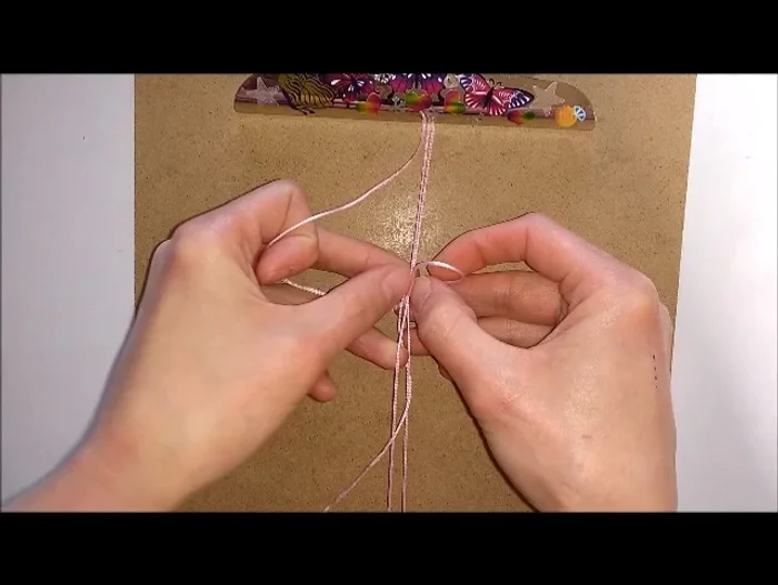 Create several hitch knots above the shorter cords (this part will be hidden).