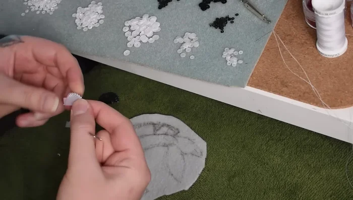 Cut and layer sequins to create the fins and tail.