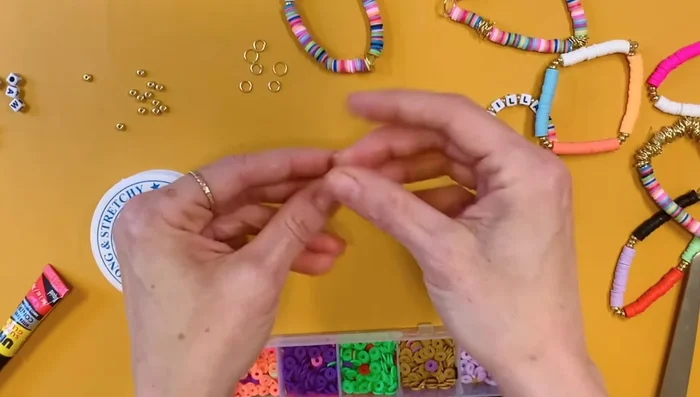 Separate color blocks with gold beads or jump rings.