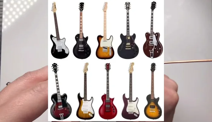 Hammer the guitar body gently to strengthen it without flattening the wire too much.