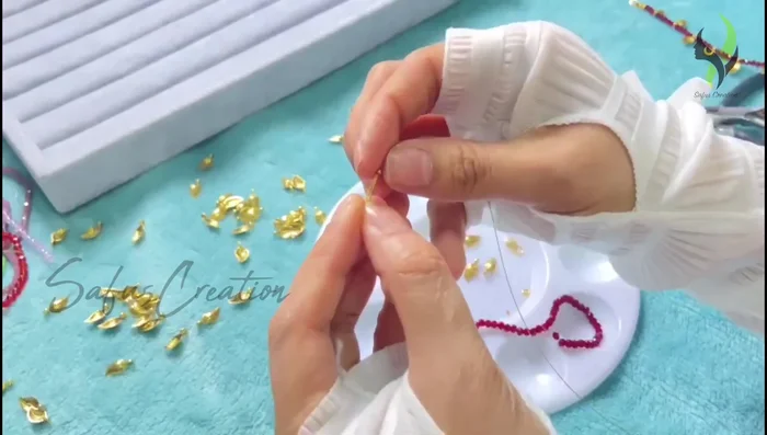 Pull the gear wire tightly and press the gear lock flat using flat nose pliers.