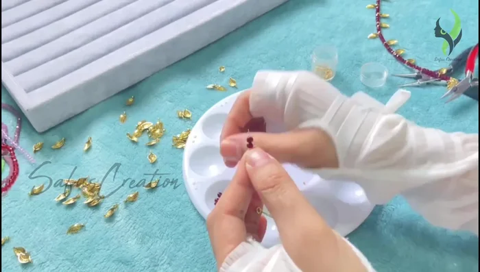 Continue adding beads and charms until you reach the desired length.