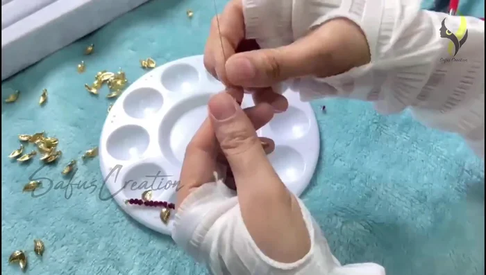 Pull the gear wire tightly (but slightly loose to avoid stiffness), press the gear lock flat, and cut the excess wire.