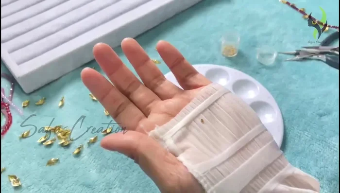 Pull the gear wire tightly and press the gear lock flat using flat nose pliers.