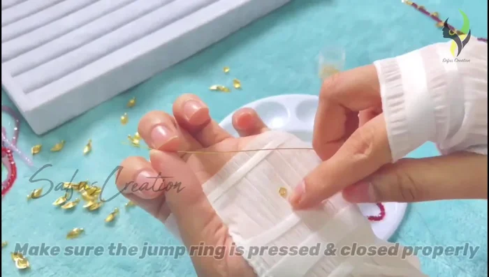 Pull the gear wire tightly and press the gear lock flat using flat nose pliers.