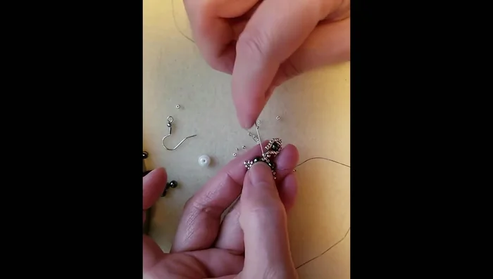 Add one size 11 seed bead, then pass the thread through three seed beads in the previous loop.