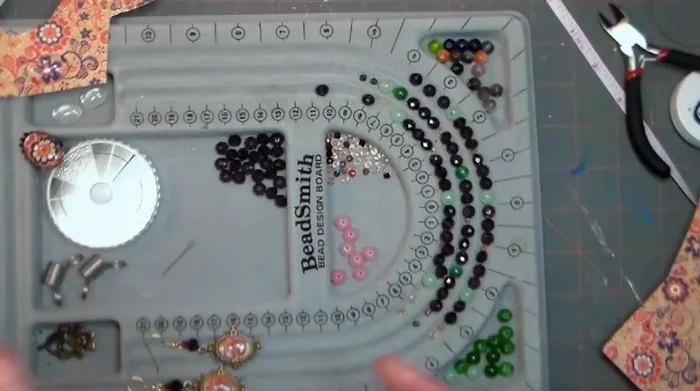 Attach clasp: Attach one end of the toggle clasp to one wire using crimp beads.