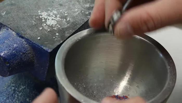 Crush larger pieces into finer dust and add to fill any remaining voids.