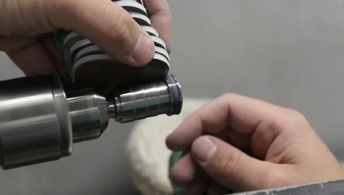 Remove excess resin and polish with mesh pads and polishing compound.