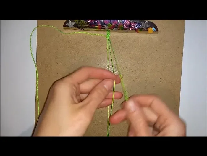 Repeat knots and beads: Repeat steps 5-7 until the bracelet reaches your desired length. Push up each bead after completing the knots.