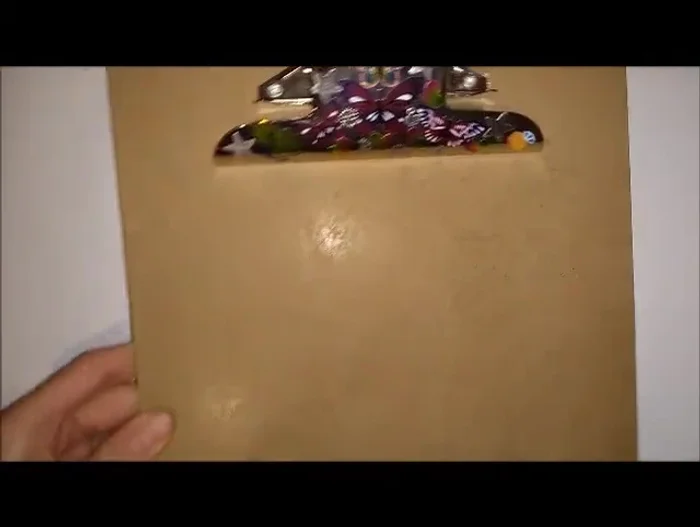 Attach to the board: Attach the cords to the top of your board. Clip the shortest cards to the bottom and place the longest cards on each side. Push the beads down.