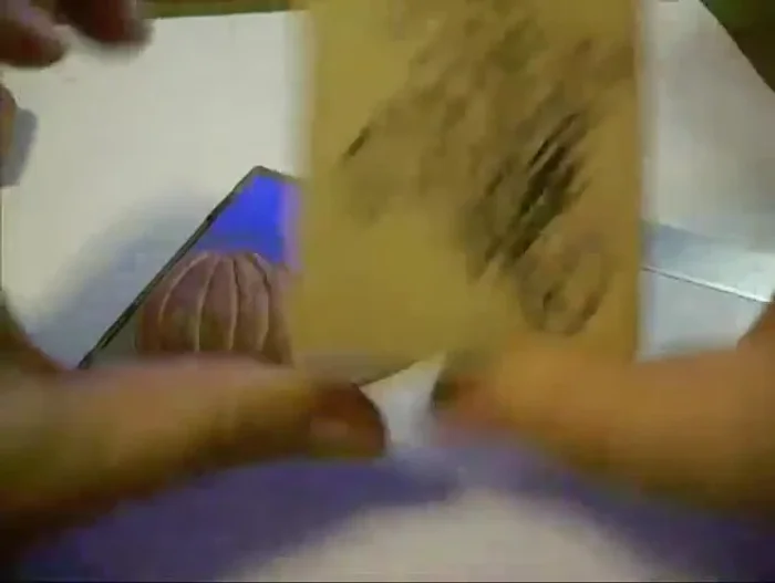 Stamp the edges of the pumpkins using a decorative stamp (optional).