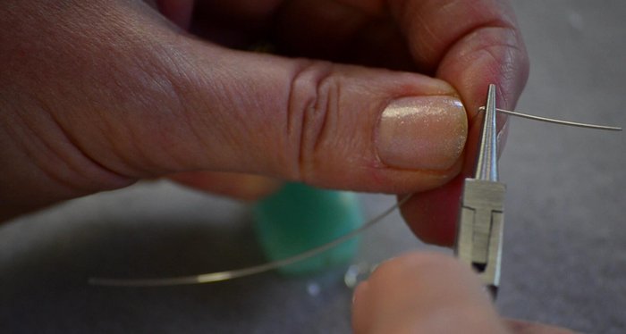 Slide a bead onto the wire.