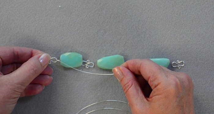 Slide a bead onto the wire.