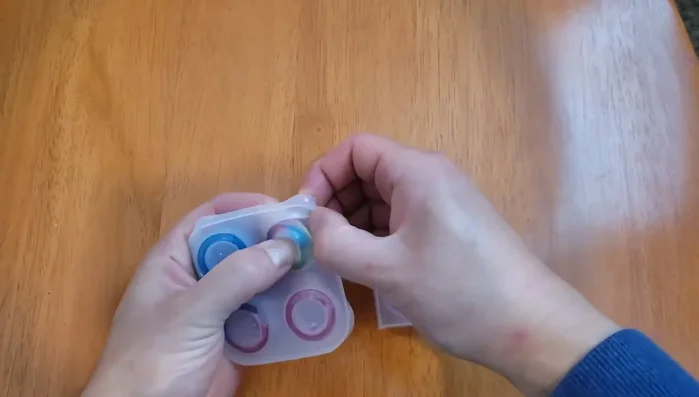 Remove rings from molds: Once cured, gently remove the rings from the silicone molds.