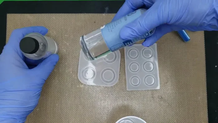 Measure resin: Measure equal parts of resin A and resin B using marked cups or by creating your own measurements.