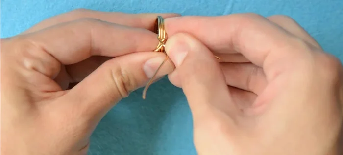 Wrap the tails again to create a neat shape.