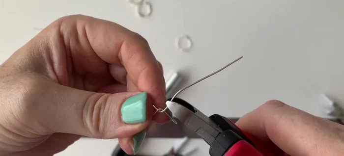 Bend the remaining wire ends around the main wire to secure the connection.