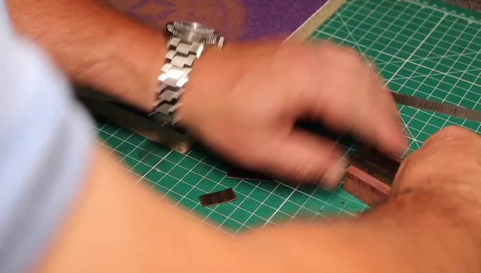 Center the blank on the lathe and turn it round.