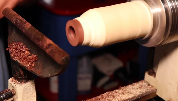 Carefully remove material with the lathe until the core fits perfectly.