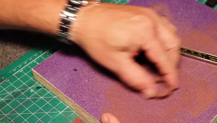 Sand the blank to exactly 6 millimeters to ensure a tight fit with the metal core pieces.