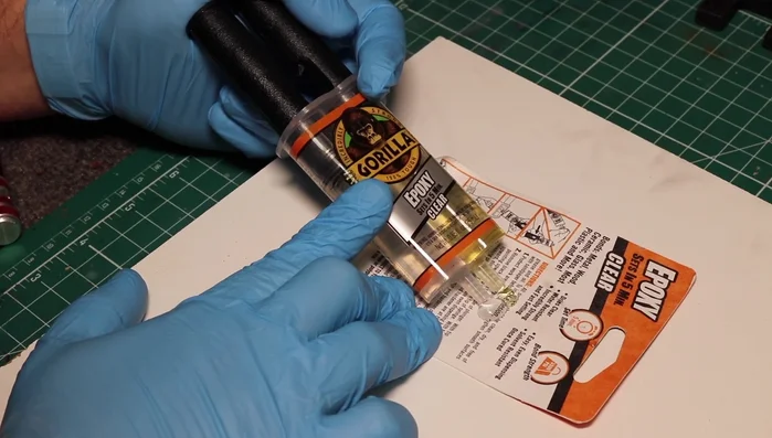 Apply five-minute epoxy to the inside of the blank and press the two core pieces together.