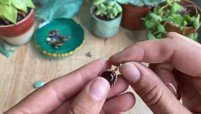 Secure the twisted wire with 28 gauge weaving wire.