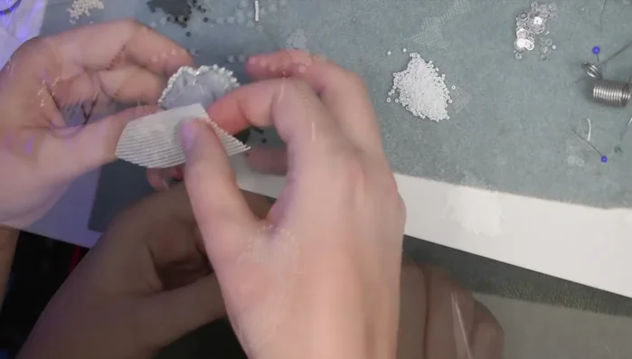 Secure a piece of buckram to the back of the felt.