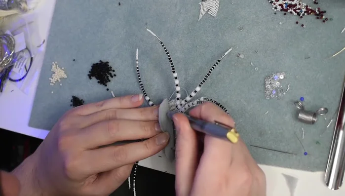 Cover the back with a final piece of felt and stitch it down neatly.