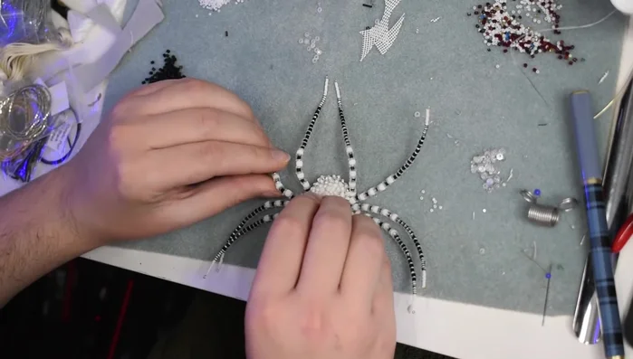 Shape and style the spider legs.