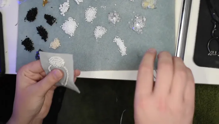 Pad the body with additional felt pieces and stitch them down.